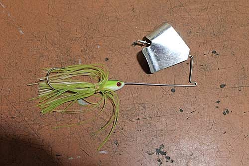 Some buzz baits come with a skirt, much like a jig. These offer a larger profile and some flash in the water. The can also be jerked on the retrieve to make the skirt flare. (Photo by Beckie Gaskill/Lakeland Times)