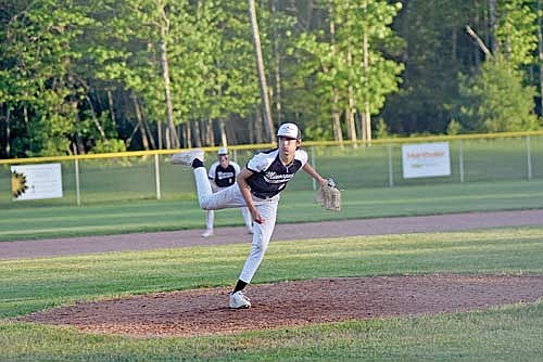 Cooper Johnson throws from the mound in a game against Rhinelander during the Rebel Invite Saturday, June 15 at Stafford Field in Rhinelander. (Photo by Brett LaBore/Lakeland Times)