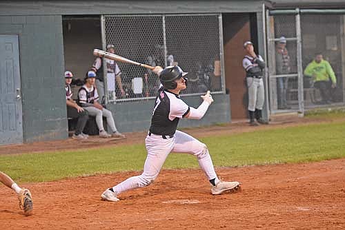 Merick Trotter delivers an RBI single to right in the seventh inning against Tomahawk Tuesday, June 11 at Tyler Kahle Memorial Field in Tomahawk. Trotter drove in the go-ahead run. (Photo by Brett LaBore/Lakeland Times)