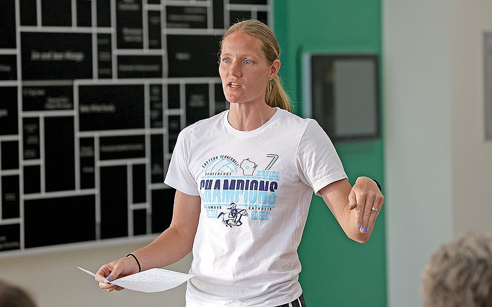 Jayme Wyss addresses Rhinelander High School volleyball players and parents during a recent meeting in the RHS commons. Wyss takes over as the new head coach of the program in 2024, replacing Dan Wolter, who resigned following three years at the helm. (Bob Mainhardt for the River News)