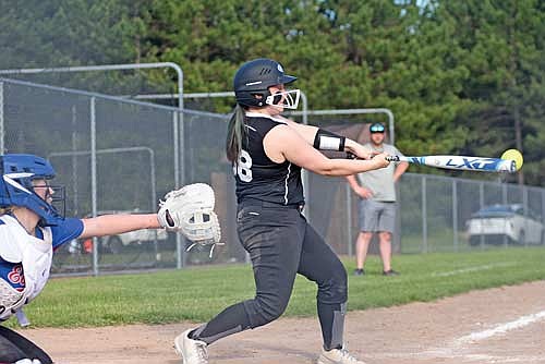 Ryllie Burmeister hits a two-run double in the third inning of an 18-1 win over Eagle River Wednesday, June 12 at Northland Pines High School in Eagle River. (Photo by Brett LaBore/Lakeland Times)