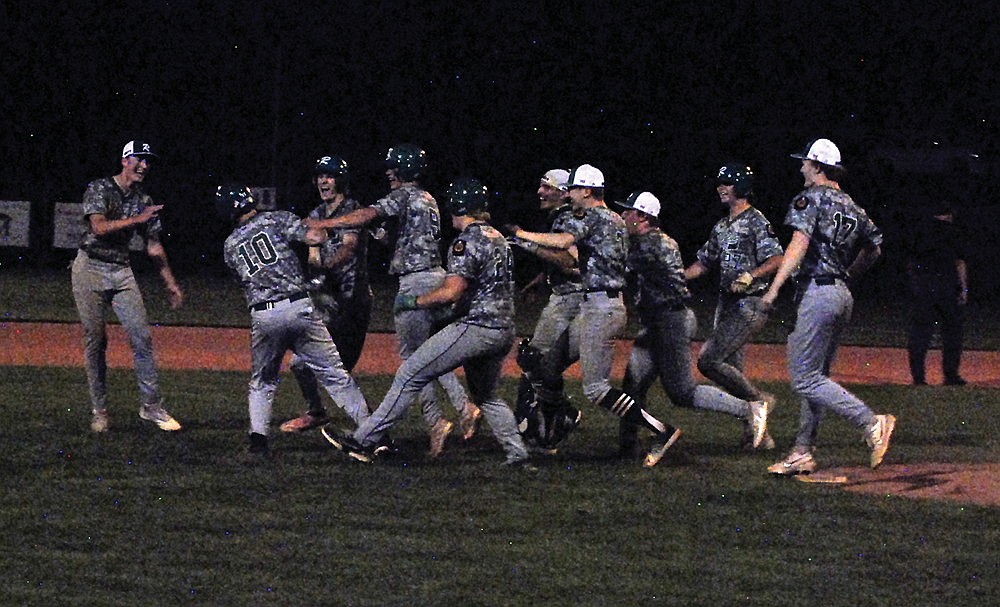 The Rhinelander Post 7 Rebels celebrate after defeating Fond du Lac Springs 9-8 in an American Legion Baseball game at Stafford Field Friday, June 14. Sam Schneider delivered a walk-off double as the Rebels rallied from down 8-4 in the sixth to win the game. (Weston Kibler/Submitted)