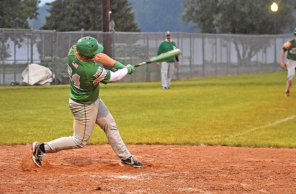 Rhinelander’s Owen Kurtz hits a two-run singles in the fourth inning of an American Legion baseball game against Minocqua at Stafford Field Saturday, June 15. Kurtz had three hits in the game as the Rebels beat the 89ers, 14-0. (Brett LaBore/Lakeland Times)