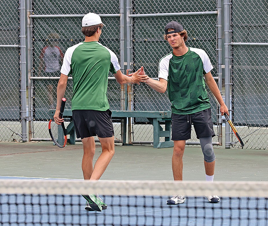 In this May 17, 2024 file photo, Rhinelander’s Dalton Fritz, left, and Joey Belanger congratulate each other following a point during the GNC boys’ tennis tournament at the RHS tennis courts. Fritz and Belanger were GNC doubles players of the year and advanced to the second round of the WIAA state tournament this spring. (Bob Mainhardt for the River News)