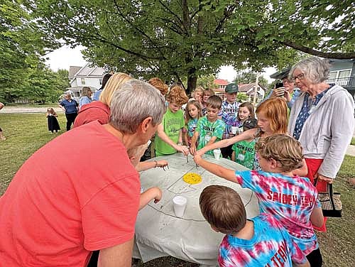 The annual worm race at the Rhinelander District Library is one of the marquee events of the summer. (River News file photo)