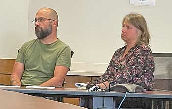 Dale and Beth Soltow listen to the discussion regarding a resolution calling for support of her recall as Vilas County clerk of courts during Tuesday’s meeting of the Vilas County board. (Photo by Brian Jopek/Lakeland Times)