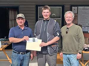 The NWAWC awarded Cameron Patton-Lopez a scholarship for his grades, demeanor and commitment to the Northwoods and outdoor sports. Pictured, from left to right: Pete Wetzler, NWAWC president, Cameron Patton-Lopez, Kevin Philpott, NWAWC treasurer. (Contributed photograph)