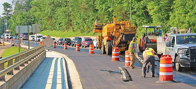 American Asphalt paves a stretch of U.S. Highway 51 between Manitou Park Drive and the Hwy. 51 bridge on Tuesday, June 18, in Minocqua. (Photo by Mikey Rottier/Lakeland Times)