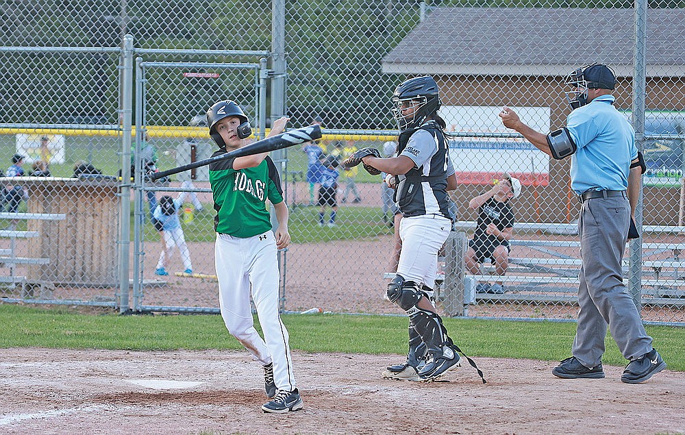 Rhinelander’s Henry Schmitz tosses his bat after drawing a walk during a Northwoods Babe Ruth Senior League game against Lakeland in Minocqua Tuesday, June 25. (Bob Mainhardt for the River News)