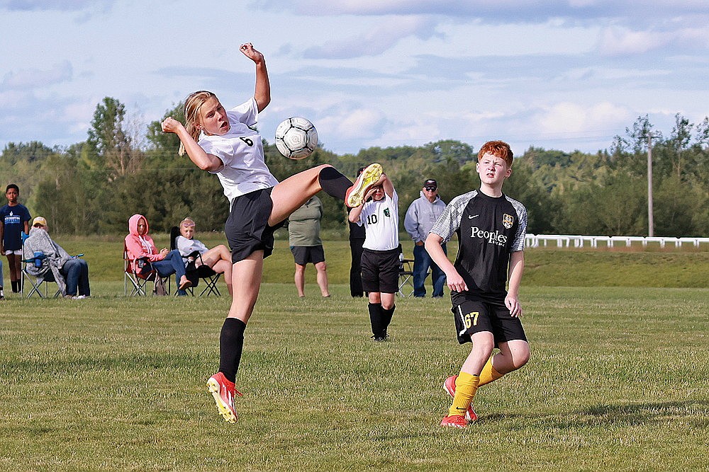 Jade Chiamulera plays the ball in the air for the Hodags.