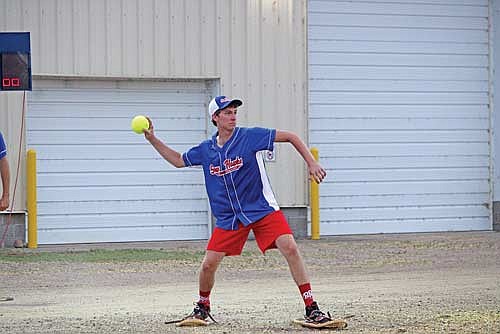 Snowhawks’ rookie Ryan Morien, who knocked in the winning run, throws the ball to the cut-off man from left field. (Photo by Trevor Greene/Lakeland Times)