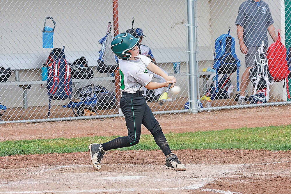 Gage Dantoin hits an RBI double during a game against Merrill Monday, July 8. (Bob Mainhardt for the River News)