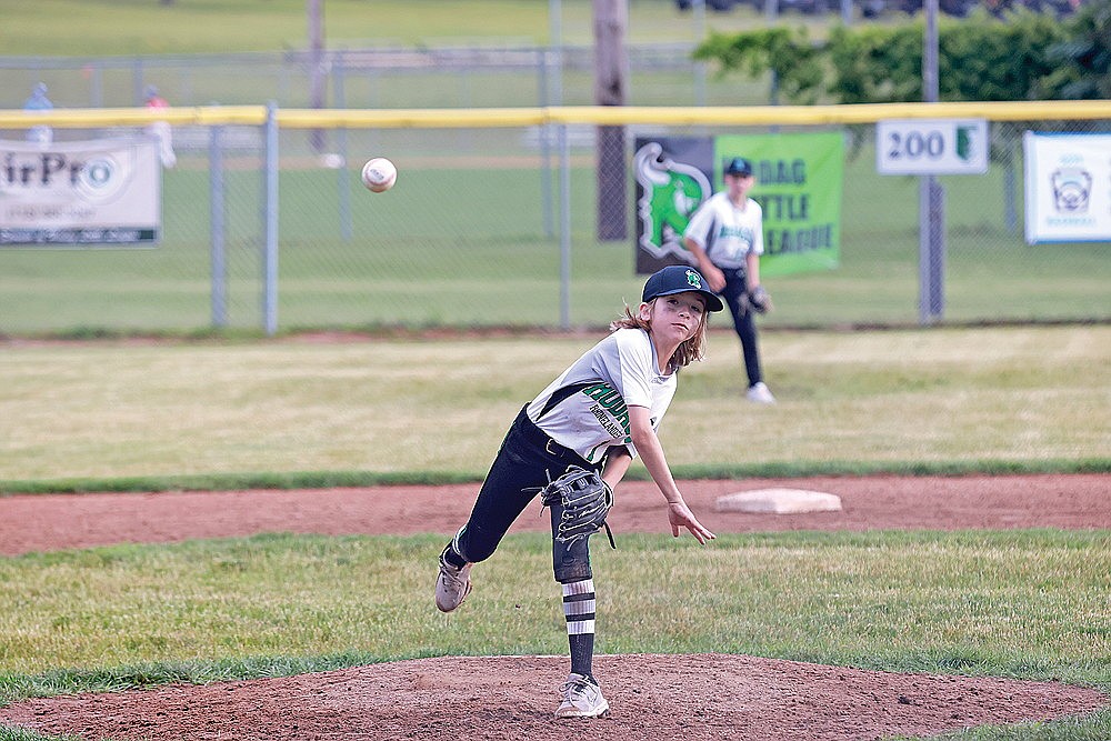 Cooper Clark pitches against Merrill Monday, July 8. (Bob Mainhardt for the River News)