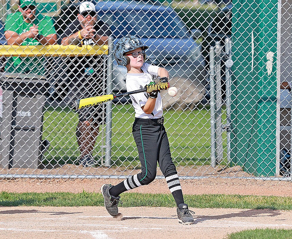 Watson White swings at a pitch during a game against Wausau American Tuesday, July 9. (Bob Mainhardt for the River News)