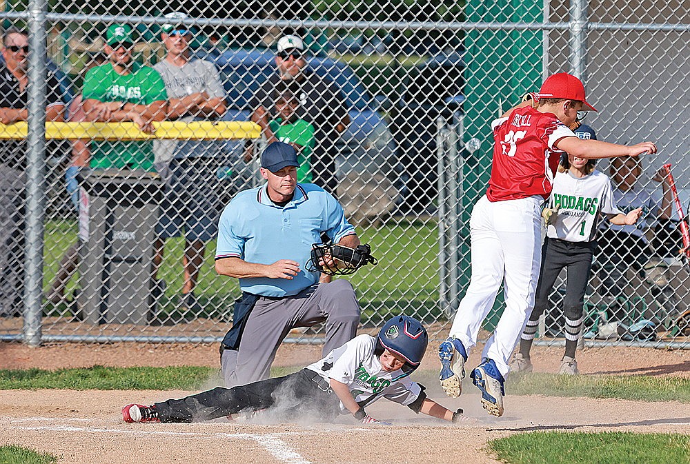 Max Maufort sidles home to score the go-ahead run during a game against Wausau American Tuesday, July 9. (Bob Mainhardt for the River News)