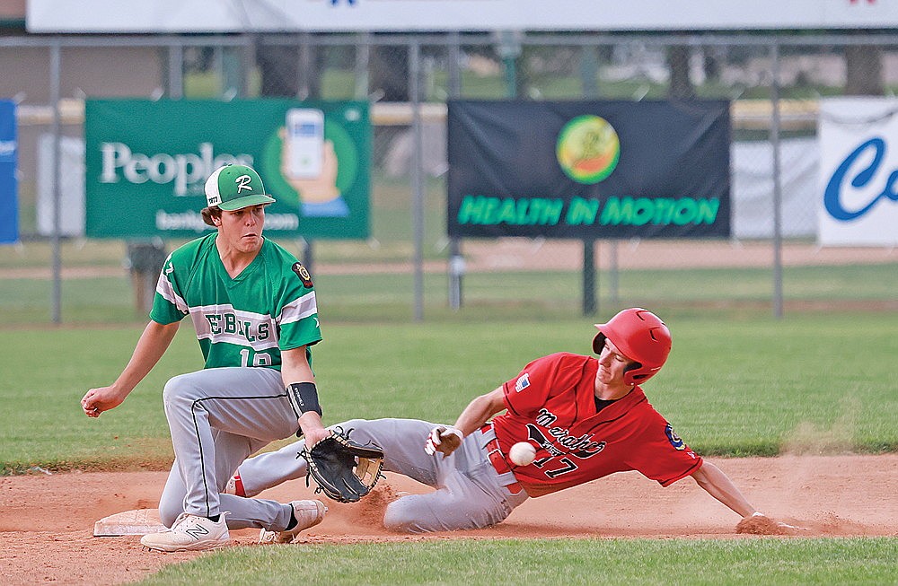 Rhinelander’s Cody Everson fields a throw to second as Marathon’s Cody Radtke steals a base during the second inning of an American Legion baseball game at Stafford Field Monday, July 15. (Bob Mainhardt for the River News)