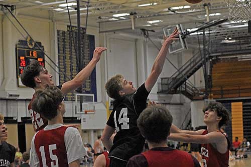 Jackson Burnett makes a layup in the second half against Spencer Tuesday, July 16 at Wausau West High School. (Photo by Brett LaBore/Lakeland Times)