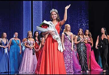 Olivia Negri, 17, of Park Falls, dons a crown to signify the title of Miss Wisconsin Teen USA 2024 at the Miss Wisconsin USA pageant on Saturday, June 15, at Verona Area High School Performing Arts Center in Verona. (Photo courtesy of Future productions, LLC)