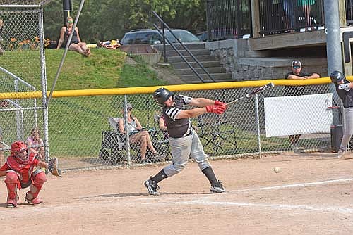 Owen Sauer delivers a two-run single to right in the fifth inning against Crandon during the Antigo Dugout Club Tournament Saturday, July 20 at Al Remington Ball Field in Antigo. (Photo by Brett LaBore/Lakeland Times)