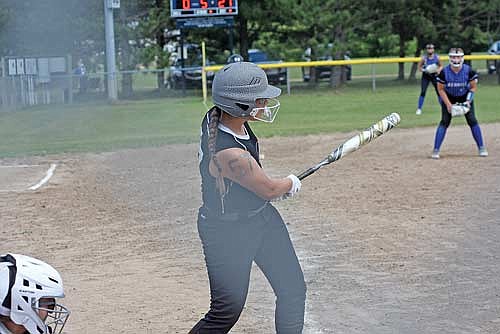 Kaitlyn Moore hits an RBI double to left in the fifth inning against Merrill’s 12U team during the Rod Timm Memorial Girls’ Fast Pitch Tournament Friday, July 19 at Sara Park in Tomahawk. (Photo by Brett LaBore/Lakeland Times)