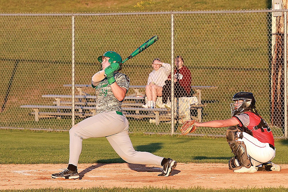 Rhinelander’s Owen Kurtz hits a double during an American Legion baseball game against Medford at Stafford Field Wednesday, July 17. Kurtz went 3 for 4 with three RBIs and finished a home run short of the cycle, but the Rebels fell to the Raiders, 6-4. (Bob Mainhardt for the River News)