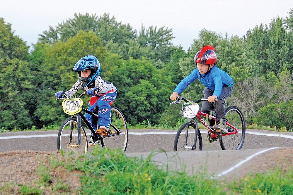 Jake Kurth (524) of Fall Creek and Gavin Grant (451) of Rhinelander jockey for position in the 8 Cruiser class.