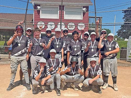 The Thunderbirds celebrate their tournament championship after beating Chippewa Falls 15-5 in the 12U championship game of the Antigo Dugout Club Tournament Sunday, July 21 at Al Remington Ball Field in Antigo. Pictured, back row from left, are assistant coaches Lawrence Eslinger, William Poupart, Travis DeGolier and Victor Gee, head coach Robert Blohm; middle row, William Schuman, Parker Ecklund, Bryce Short, Taitum Bauman, Caleb Karch, Owen Sauer; front row, Logan DeGolier, Levi Eslinger, Michael Blohm and Emmit Gee. (Contributed photograph)