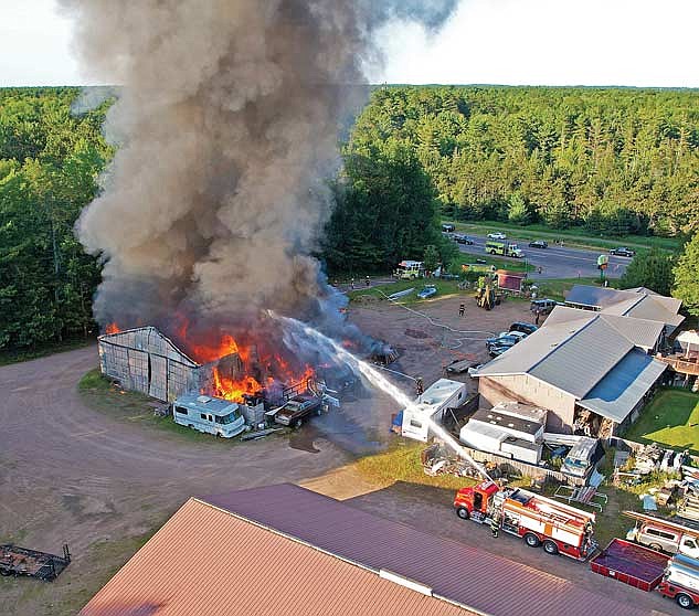 An overhead view of Sunday’s fire in Arbor Vitae. (Photo by Dean Hall/Lakeland Times)