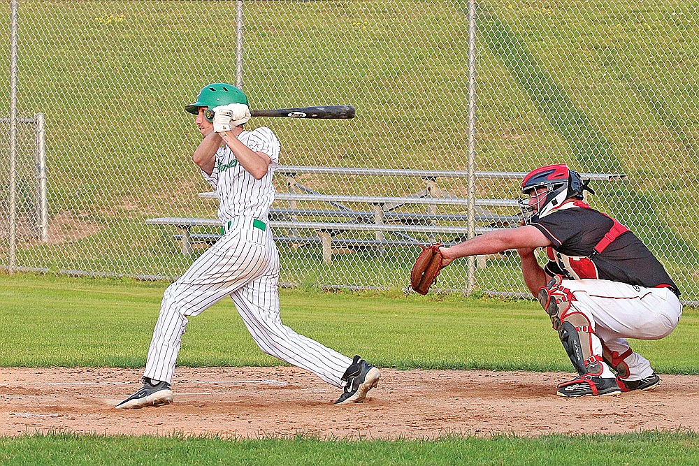 Rhinelander’s Josh Randolph hits an RBI single during the fourth inning of a Dairyland League baseball game against Whittlesey at Stafford Field Saturday, July 27. Randolph went 4 for 5 with 5 RBIs in the River Monsters’ 9-6 victory. (Bob Mainhardt for the River News)