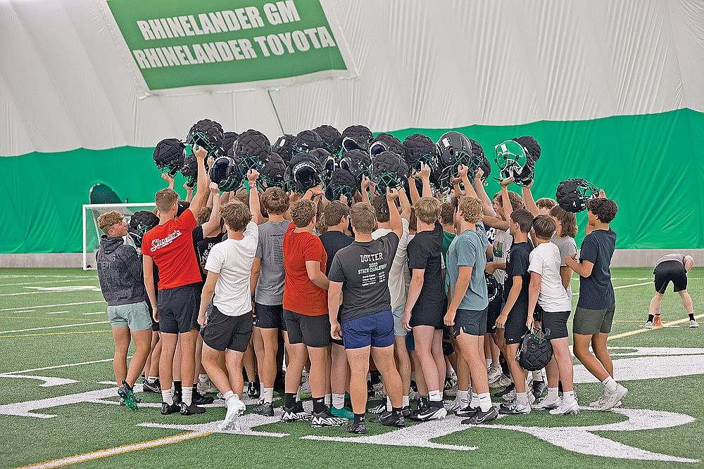 Participants in the Hodag football camp break a huddle Monday, July 22 in the Hodag Dome. More than 70 high schoolers took part in the camp. The Hodags held a four-day camp July 22-25 which concluded the team’s offseason activities for the summer. Fall practice begins Aug. 6. (Bob Mainhardt for the River News)