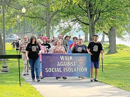 Approximately 50 people participated in the March Against Social Isolation Saturday, July 27. 2024 at Rhinelander’s Hodag Park. (Photo by Heather Schaefer/River News)