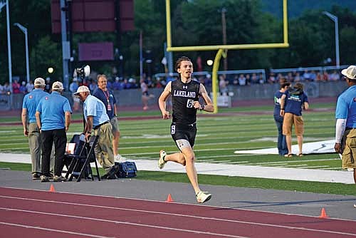 In this May 31, 2024 file photo, Owen Clark comes to the finish line of the 3,200-meter run during the WIAA Track and Field State Championships at Veterans Memorial Stadium Complex in La Crosse. Clark took first with a time of 9:11.71 to become the Division 2 state champion. (Photo by Brett LaBore/Lakeland Times)