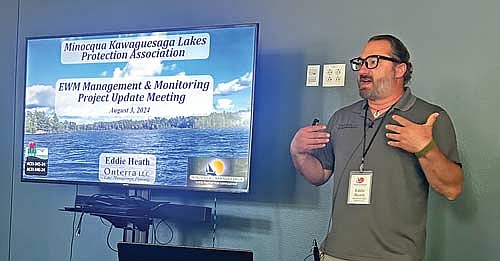 Aquatic ecologist for Onterra LLC Eddie Heath broke down the science behind the treatment of EWM in Minocqua and Kawaguesaga lakes at the annual MKLPA meeting on Saturday, Aug.3, at the Minocqua Fire Department. (Photo by Mikey Rottier/Lakeland Times)