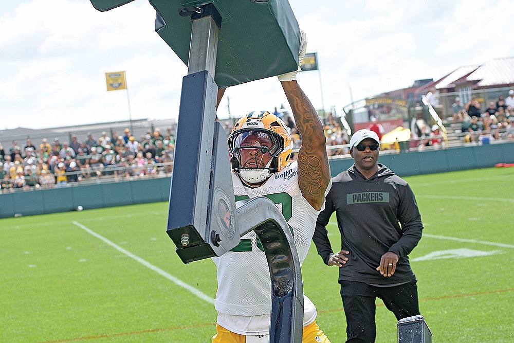 Packers’ running back AJ Dillon goes through a drill.
