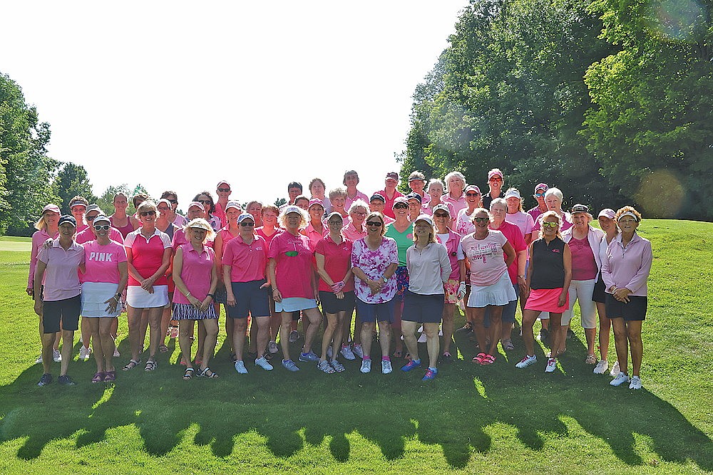 Participants in this year’s event gather for a group photograph prior to last Tuesday’s round. (Jeremy Mayo/River News)