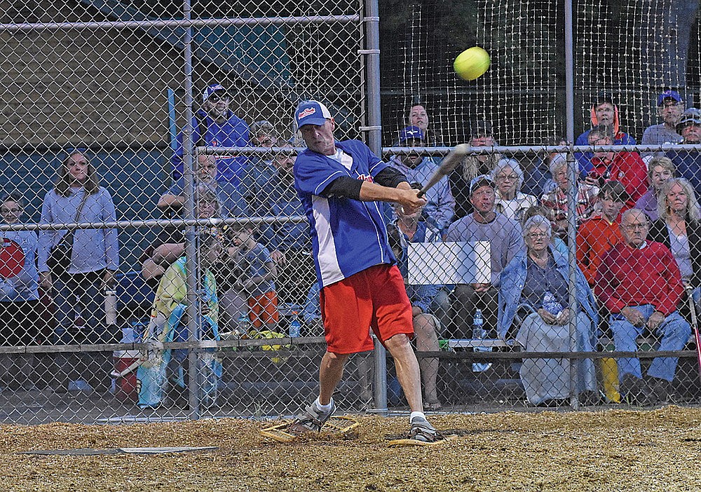 Tod Niemuth drives in a run in the fourth inning against WPS Local 420 Monday, Aug. 19 at Snowshoe Park in Lake Tomahawk. (Brett LaBore/Lakeland Times)