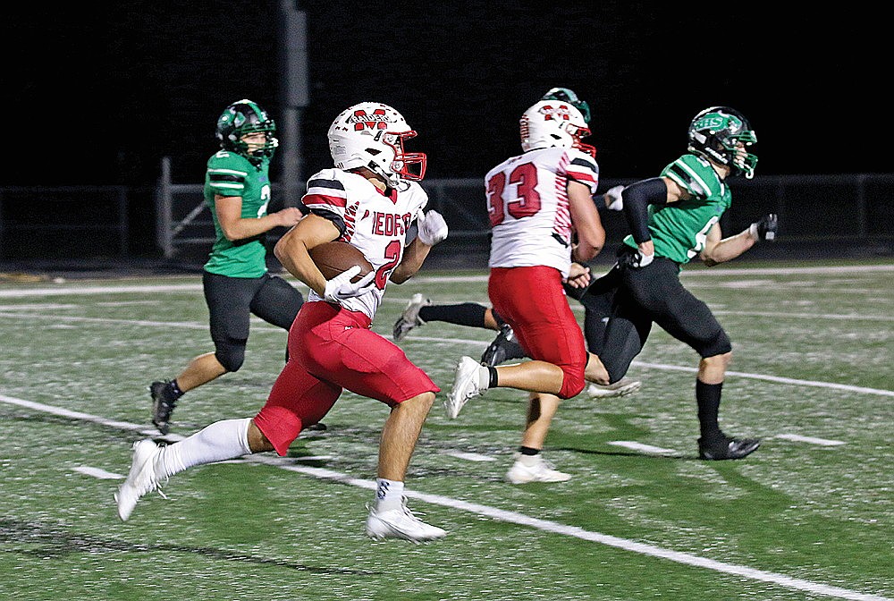 In this Sept. 29, 2023 file photo, Medford’s Paxton Rothmeier carries the football during a GNC football game at Rhinelander. Rothmeier was the top rusher in the GNC last fall and leads the Raiders, who were picked to win the conference in the annual GNC football media poll. (Bob Mainhardt for the River News)