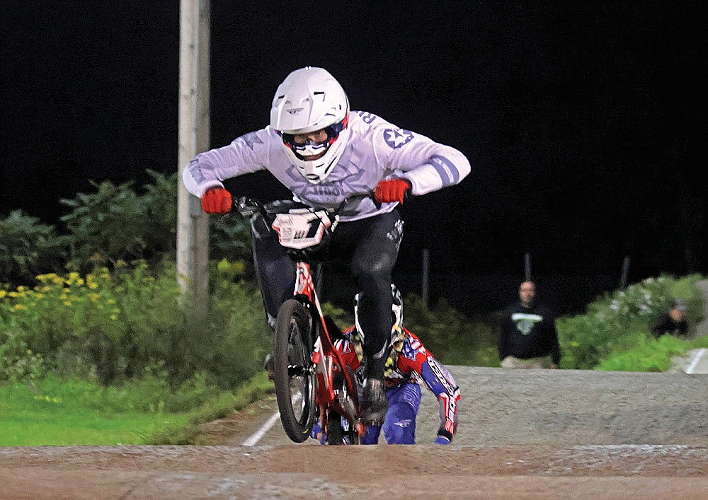 Taylor Riedemann of St. Francis, Minn. leads the field in the Pro-Am Open class during the Hodag BMX Club’s 25th Anniversary Race in Rhinelander Saturday, Aug. 17. Riedemann won the main event, and the lion’s share of a more than $3,000 purse in the class. (Jeremy Mayo/River News)