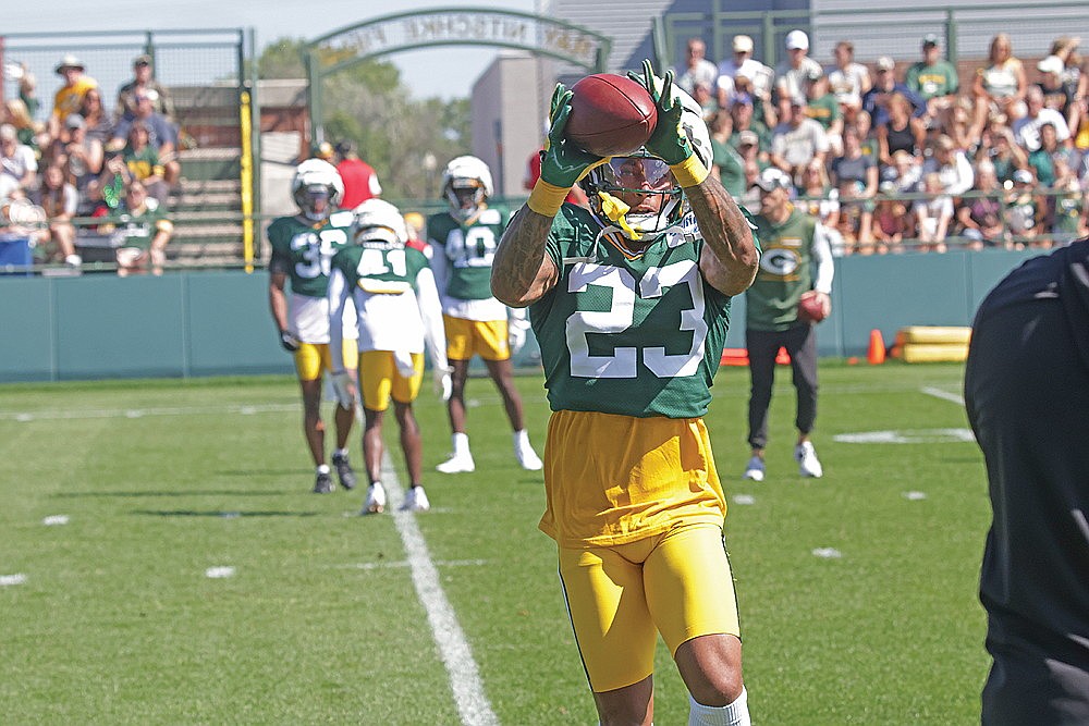Green Bay Packers cornerback Jaire Alexander catches the ball in a defensive drill during NFL training camp practice in Green Bay Tuesday, Aug. 20.