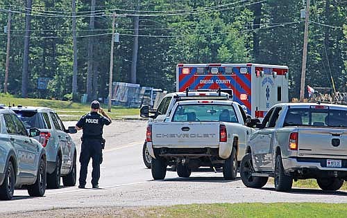 Law enforcement and emergency medical personnel at the scene Tuesday of a crash on U.S. Highway 51 just south of the intersection with Timber Ridge Road that resulted in the death of an Oconomowoc woman. (Photo by Trevor Greene/Lakeland Times)