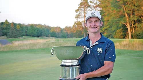 Max Lyons of Peoria, Ariz. holds the trophy after winning the Wisconsin State Open Wednesday, Aug. 21 at Minocqua Country Club. Lyons held off a pack of golfers to win the State Open at 16-under par. (Photo by Jim Kelsh/wisconsin.golf)