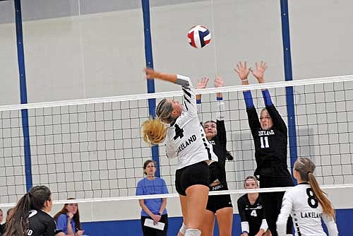 Stina Peterson goes for a spike in a scrimmage against Three Lakes Saturday, Aug. 24 at Northland Pines High School in Eagle River. (Photo by Brett LaBore/Lakeland Times)