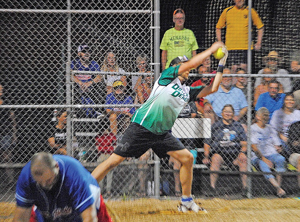 Ian Miller of Dazzle’s Demons makes a catch at home plate to complete a double play in the sixth inning Monday, Aug. 26 at Snowshoe Park in Lake Tomahawk. (Brett LaBore/Lakeland Times)