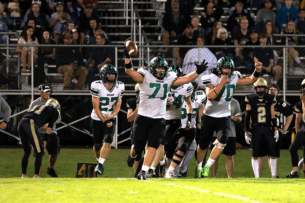 Rhinelander’s Reid Schultz reacts after recording an interception during the third quarter of a non-conference football game at Hayward Friday, Aug. 30. The Hodag defense intercepted Hayward’s Keegan Walsh four times as Rhinelander defeated the Hurricanes, 21-7. (Bob Mainhardt for the River NEws)