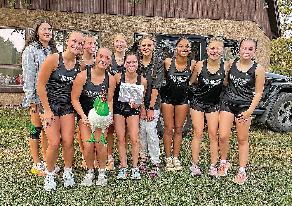 The Rhinelander High School girls’ cross country team poses with the championship plaque and team mascot, Henderson the rooster, following the Mosinee Invite in Wausau Tuesday, Sept. 3. Pictured, from left to right, are Luna Grage, Ella Miljevich, Wendy Fronk, Sophie Miljevich, Kara Monk, Brynn Teter, Macy Myers, Gabby Wanta, Grace Cornelius and Emily Schiek. Hayley Schiek was unavailable for the photograph. (Submitted photo)