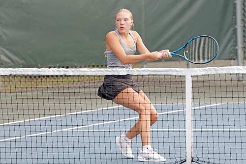 Ali Timmerman plays the ball up at the net in her No. 1 doubles match against Rhinelander Tuesday, Sept. 10 at the Rhinelander High School tennis courts. (Photo by Jeremy Mayo/River News)