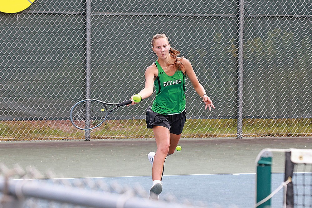 Rhinelander’s Sam Aschenbrenner hits a return during a GNC girls’ tennis dual meet against Lakeland at the RHS tennis courts Tuesday, Sept. 10. Aschenbrenner lost in a match tiebreaker at No. 4 singles as the Hodags suffered their most lopsided defeat as a member of the GNC, swept by the T-Birds 7-0. (Bob Mainhardt for the River News)