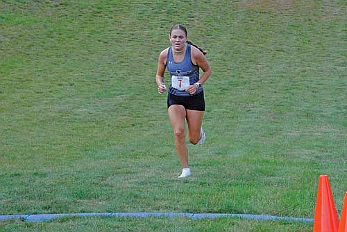 Stella Meza finishes first in the girls’ race with the top time in the Ted Voigt Invite Thursday, Sept. 12 at Minocqua Winter Park. Meza crossed the finish line in 21:24. (Photo by Brett LaBore/Lakeland Times)