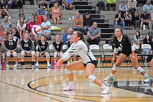 Greta Johnson makes a pass with Karlin Williams looking on in the first set of a 3-0 win over Rhinelander Tuesday, Sept. 17 at the Lakeland Union High School fieldhouse in Minocqua. (Photo by Brett LaBore/Lakeland Times)