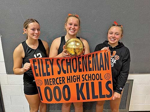 Eiley Schoeneman, middle, celebrates her 1,000th career kill with Rylinn Rossi, left, and Jenny Klopatek following a 3-0 win over South Shore Tuesday, Sept. 17 at John “JP” Pierpont Court in Mercer. (Contributed photograph)